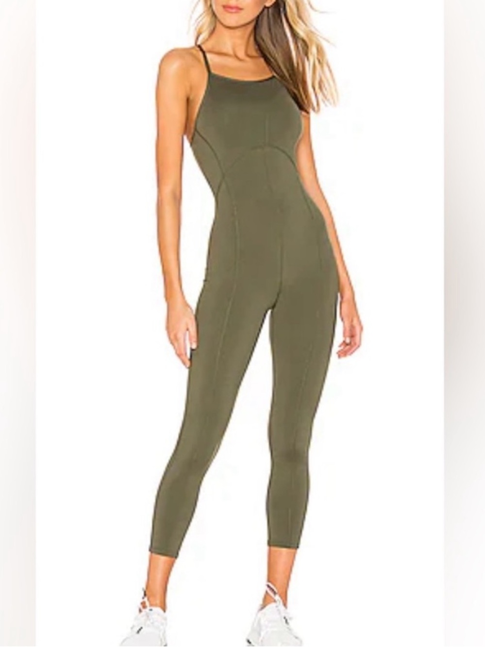 Free people movement side to side ashford open back green jumpsuit sz m